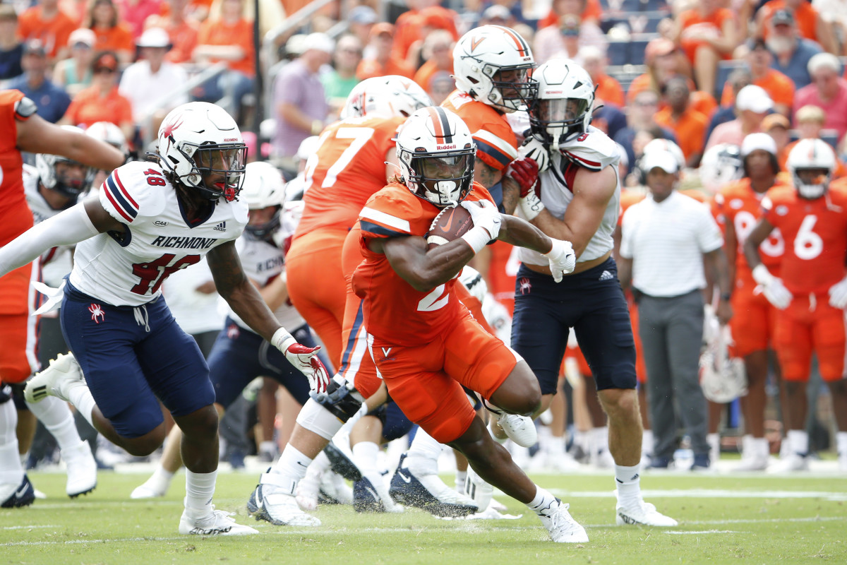 Virginia Cavaliers running back Perris Jones (2) carries the ball against the Richmond Spiders during the first half at Scott Stadium.